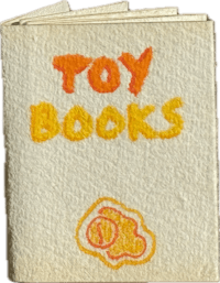 a book with the words toy books on it